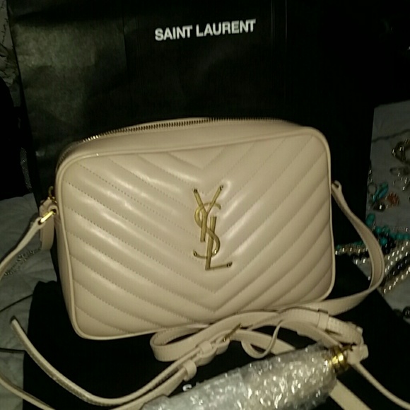Brand new ysl w tassel ~ cream - Picture 2 of 2
